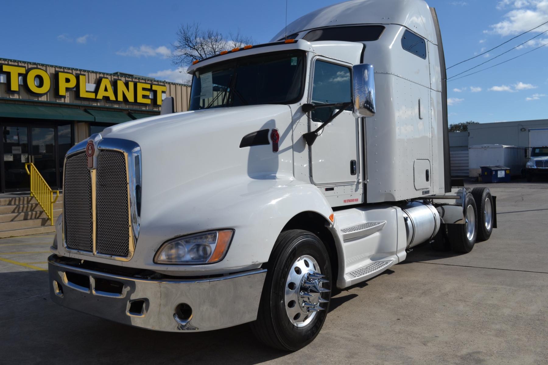 2014 WHITE KENWORTH T660 with an CUMMINS ISX 15L 450HP engine, EATON ULTRASHIFT AUTOMATED transmission, located at 9172 North Fwy, Houston, TX, 77037, (713) 910-6868, 29.887470, -95.411903 - 72" RAISED ROOF SLEEPER, RATIO: 3.42, WB: 223, 51,200LB GVWR, 40,000LB REAR AXLES, SLIDING 5TH WHEEL, ALUMINUM WHEELS, ENGINE BRAKE, DEF FLUID, BOTTOM EXHAUST, 4 BAG AIR RIDE, DUAL 100 GALLON FUEL TANKS, GOOD RUBBER, COLD A/C, CRUISE CONTROL - Photo #0