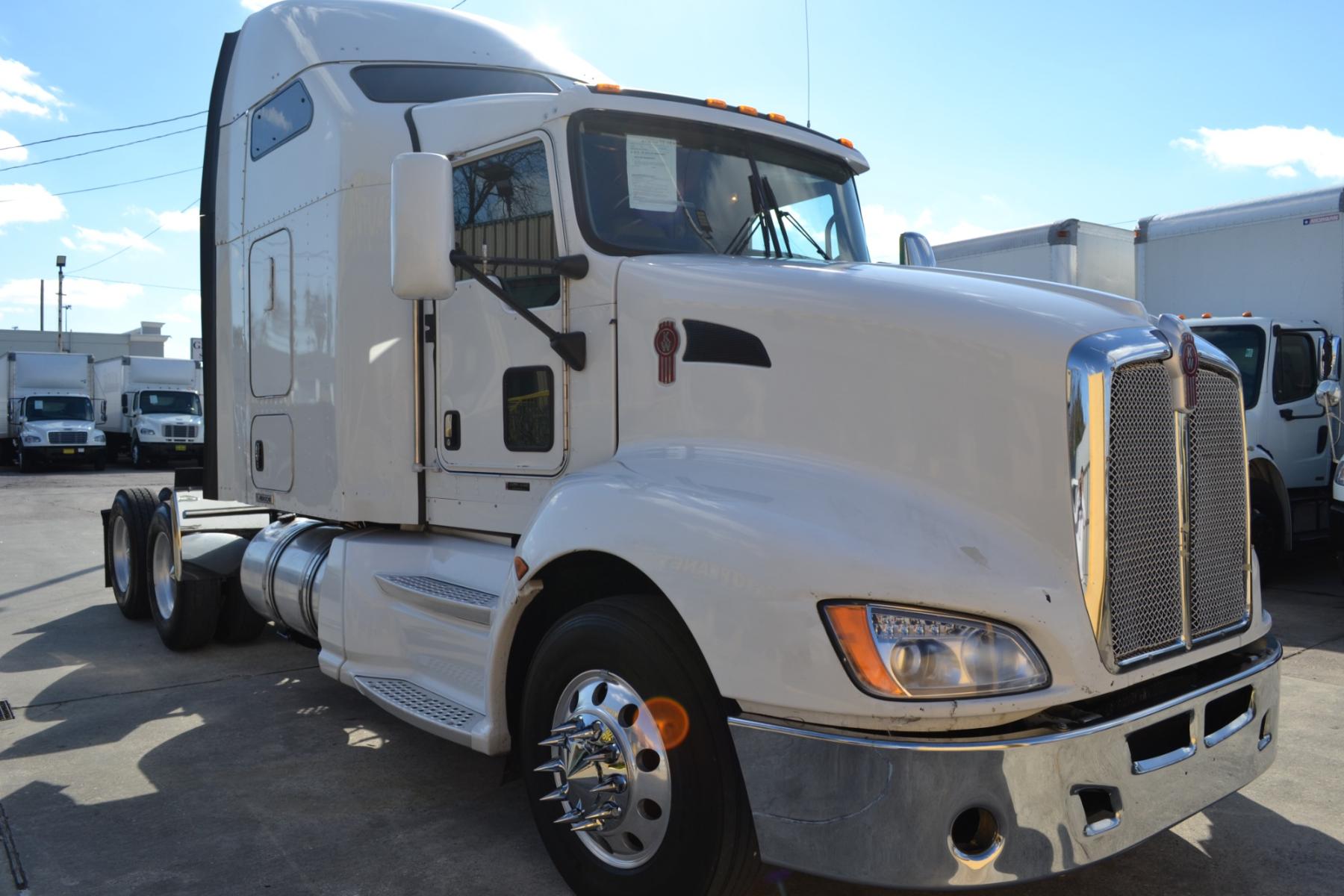 2014 WHITE KENWORTH T660 with an CUMMINS ISX 15L 450HP engine, EATON ULTRASHIFT AUTOMATED transmission, located at 9172 North Fwy, Houston, TX, 77037, (713) 910-6868, 29.887470, -95.411903 - 72" RAISED ROOF SLEEPER, RATIO: 3.42, WB: 223, 51,200LB GVWR, 40,000LB REAR AXLES, SLIDING 5TH WHEEL, ALUMINUM WHEELS, ENGINE BRAKE, DEF FLUID, BOTTOM EXHAUST, 4 BAG AIR RIDE, DUAL 100 GALLON FUEL TANKS, GOOD RUBBER, COLD A/C, CRUISE CONTROL - Photo #2