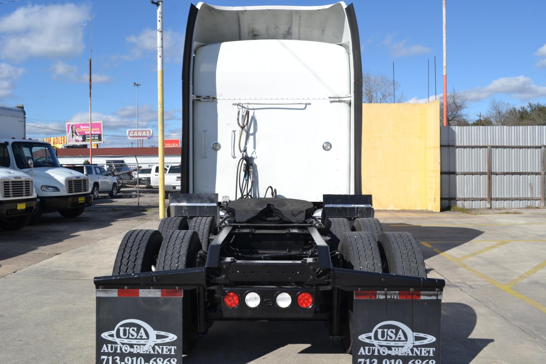 2014 WHITE KENWORTH T660 with an CUMMINS ISX 15L 450HP engine, EATON ULTRASHIFT AUTOMATED transmission, located at 9172 North Fwy, Houston, TX, 77037, (713) 910-6868, 29.887470, -95.411903 - 72" RAISED ROOF SLEEPER, RATIO: 3.42, WB: 223, 51,200LB GVWR, 40,000LB REAR AXLES, SLIDING 5TH WHEEL, ALUMINUM WHEELS, ENGINE BRAKE, DEF FLUID, BOTTOM EXHAUST, 4 BAG AIR RIDE, DUAL 100 GALLON FUEL TANKS, GOOD RUBBER, COLD A/C, CRUISE CONTROL - Photo #5