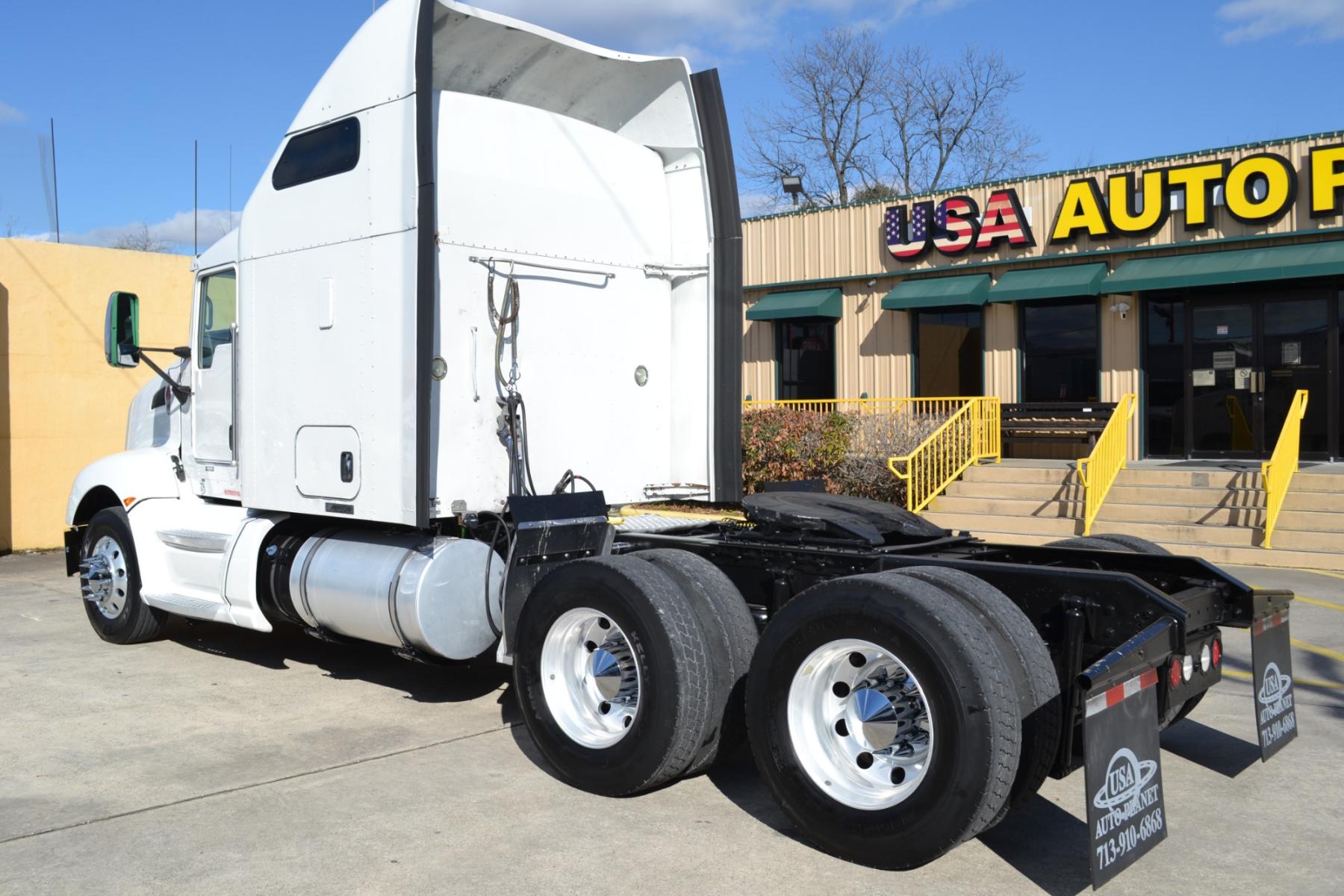 2014 WHITE KENWORTH T660 with an CUMMINS ISX 15L 450HP engine, EATON ULTRASHIFT AUTOMATED transmission, located at 9172 North Fwy, Houston, TX, 77037, (713) 910-6868, 29.887470, -95.411903 - 72" RAISED ROOF SLEEPER, RATIO: 3.42, WB: 223, 51,200LB GVWR, 40,000LB REAR AXLES, SLIDING 5TH WHEEL, ALUMINUM WHEELS, ENGINE BRAKE, DEF FLUID, BOTTOM EXHAUST, 4 BAG AIR RIDE, DUAL 100 GALLON FUEL TANKS, GOOD RUBBER, COLD A/C, CRUISE CONTROL - Photo #6