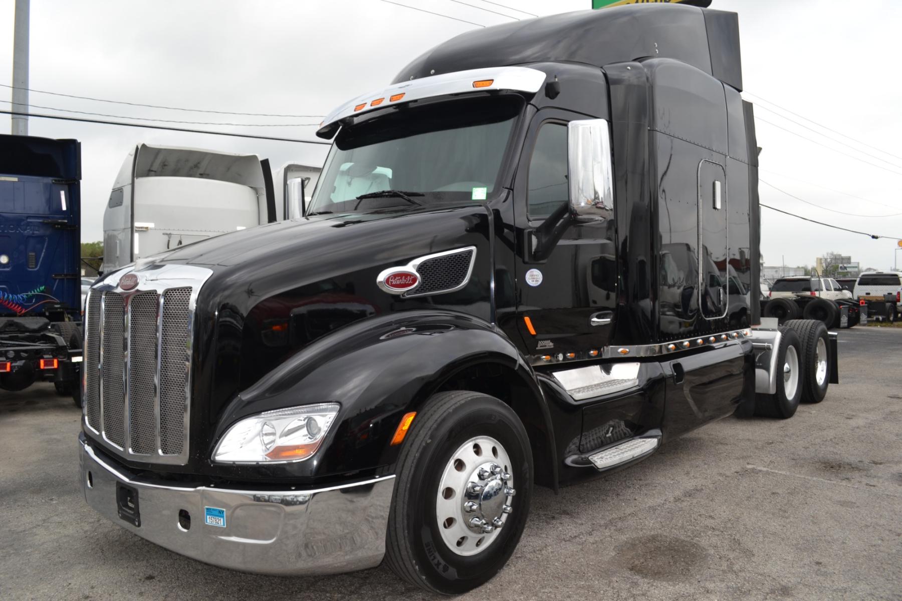 2017 BLACK PETERBILT 579 with an PACCAR MX13 500HP engine, EATON FULLER 10SPD MANUAL transmission, located at 9172 North Fwy, Houston, TX, 77037, (713) 910-6868, 29.887470, -95.411903 - 64" MID ROOF SLEEPER, WB: 240", RATIO: 3.25, DUAL 110 GALLON FUEL TANKS, APU UNIT, ALUMINUM WHEELS, SUPER SINGLES, POWER WINDOWS & LOCKS, DIFF LOCK, BUILT-IN NAVIGATION, COLLISION MITIGATION, ENGINE BRAKE, CRUISE CONTROL, - Photo #0