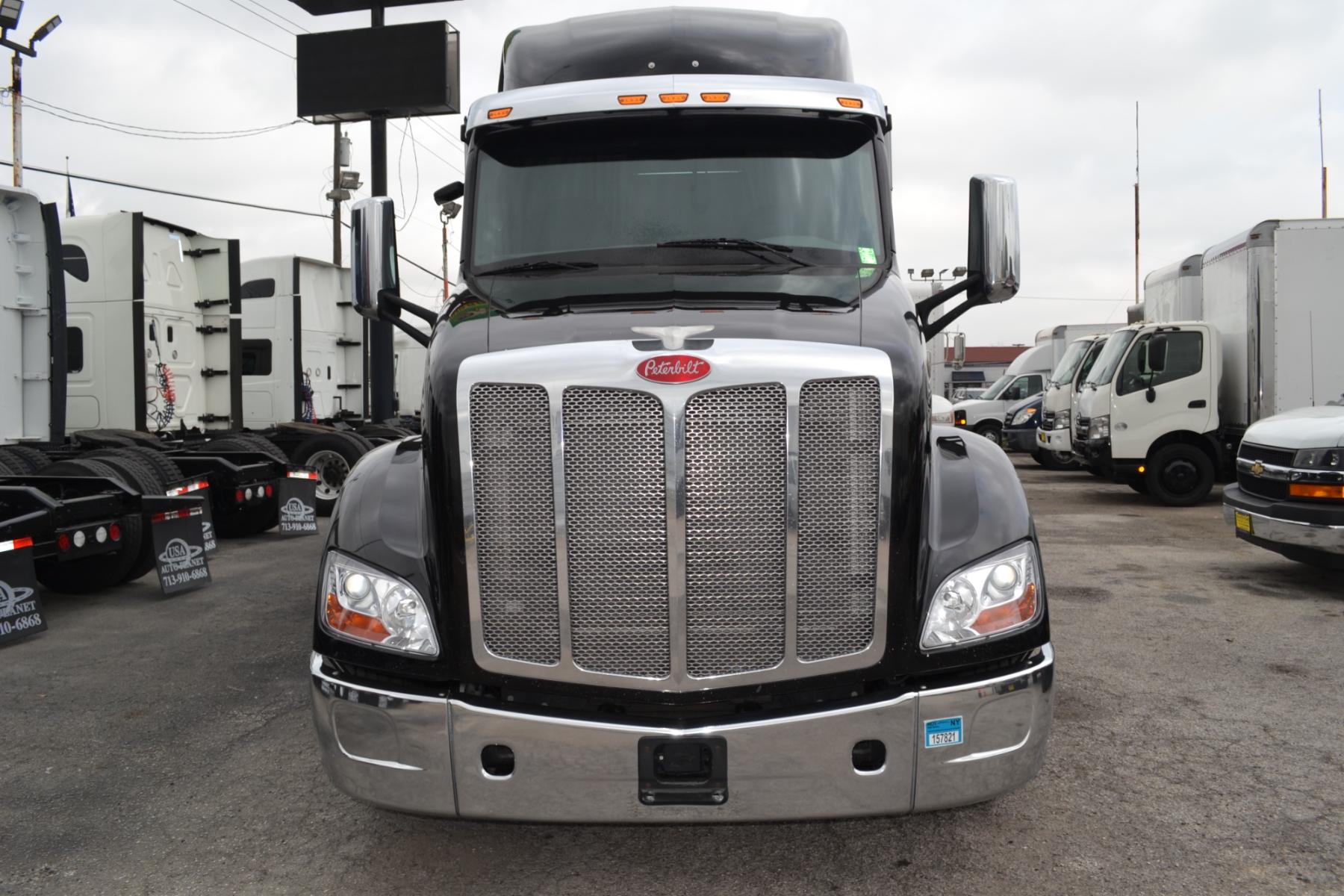 2017 BLACK PETERBILT 579 with an PACCAR MX13 500HP engine, EATON FULLER 10SPD MANUAL transmission, located at 9172 North Fwy, Houston, TX, 77037, (713) 910-6868, 29.887470, -95.411903 - 64" MID ROOF SLEEPER, WB: 240", RATIO: 3.25, DUAL 110 GALLON FUEL TANKS, APU UNIT, ALUMINUM WHEELS, SUPER SINGLES, POWER WINDOWS & LOCKS, DIFF LOCK, BUILT-IN NAVIGATION, COLLISION MITIGATION, ENGINE BRAKE, CRUISE CONTROL, - Photo #1