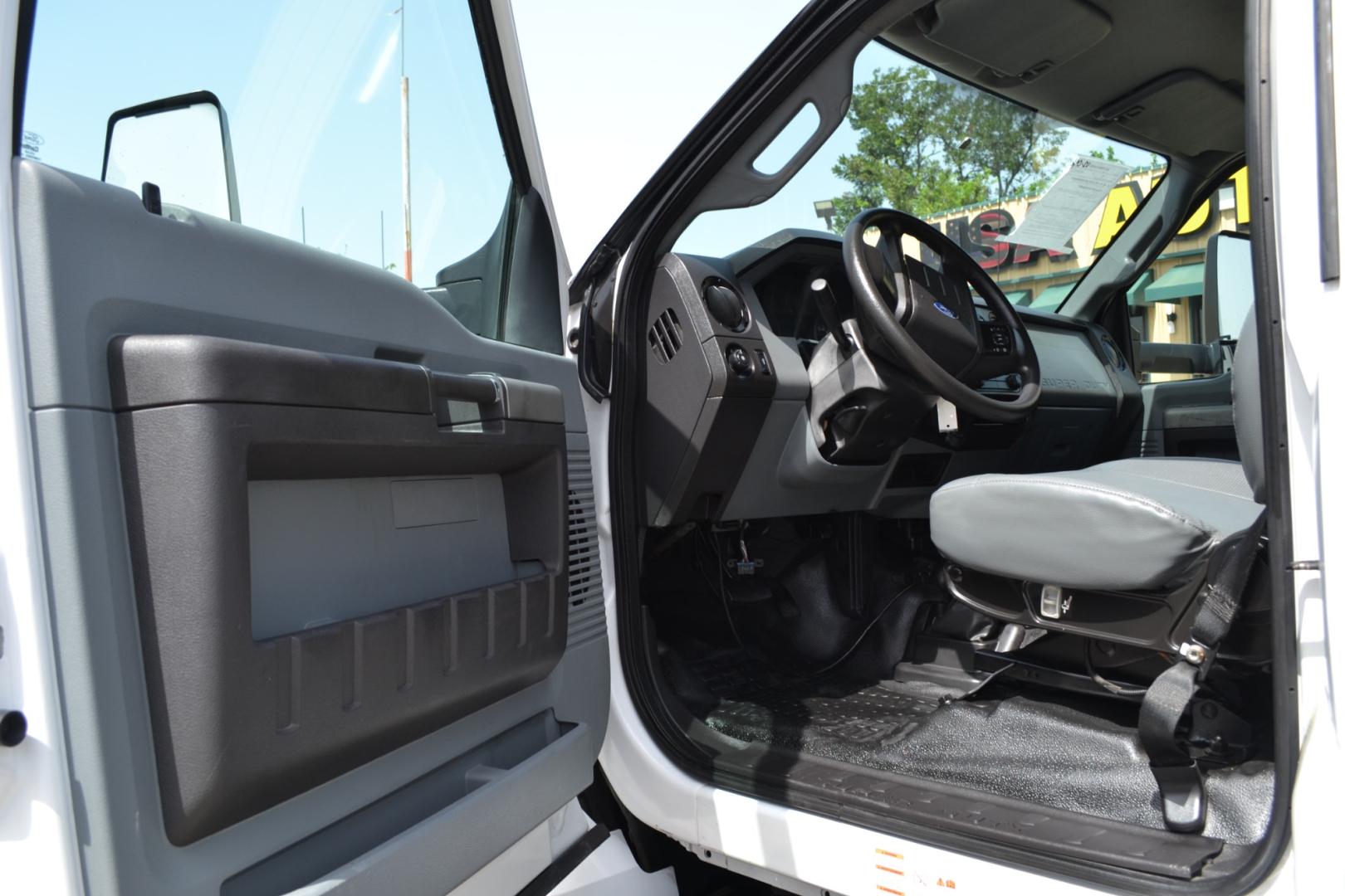 2016 WHITE /GRAY Ford F-650 with an TRITON 6.8L V10 320HP engine, TORQSHIFT 6SPD AUTOMATIC transmission, located at 9172 North Fwy, Houston, TX, 77037, (713) 910-6868, 29.887470, -95.411903 - 26,000LB GVWR NON CDL, 24FT FLATBED , 102" WIDE, MAXON 2,500LB CAPACITY STEEL LIFT GATE, WB: 260", RATIO: 3.91, HYDRAULIC BRAKES, 4 X SLIDING STRAP WINCHES, 50 GALLON FUEL TANK - Photo#14