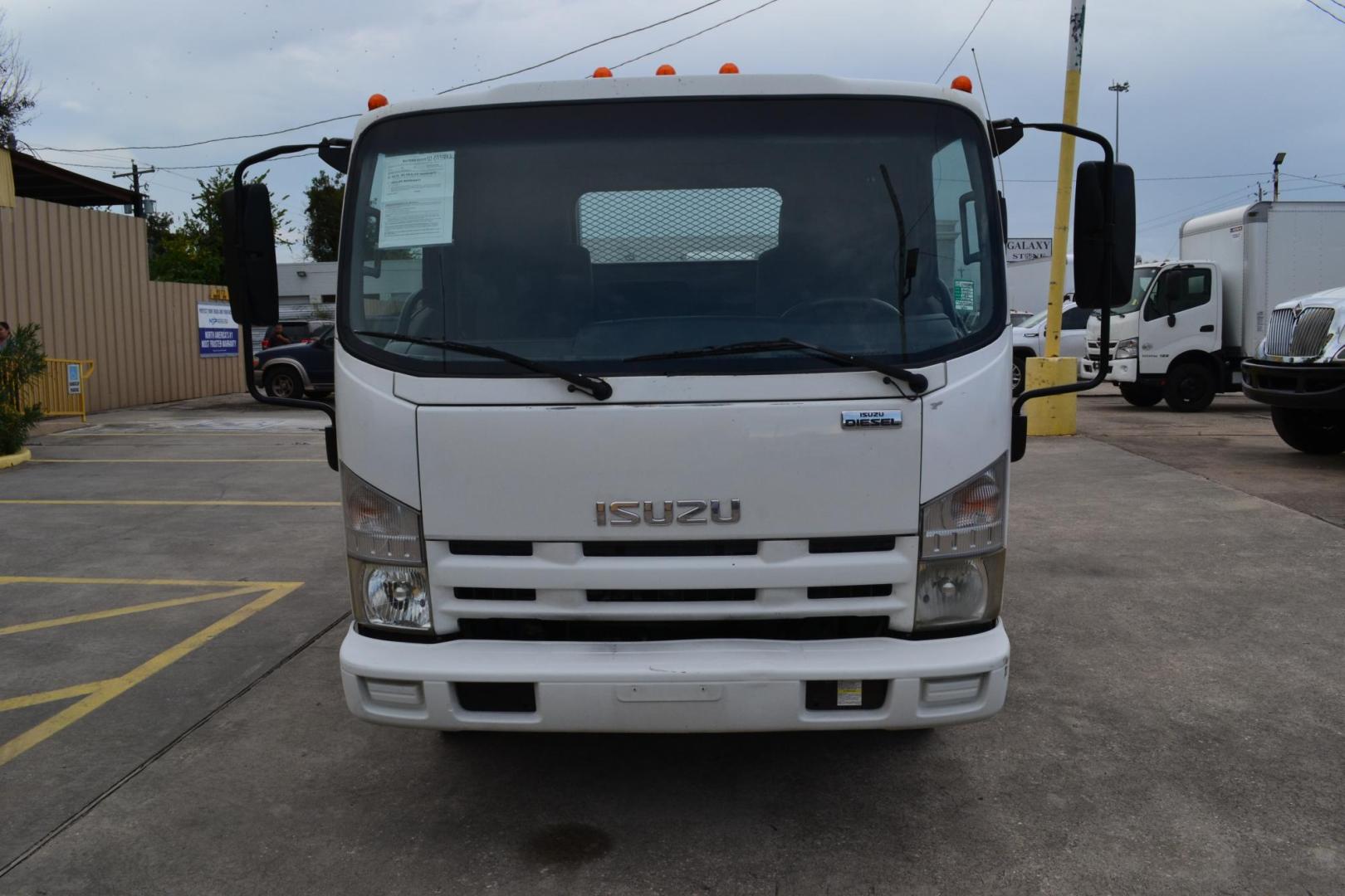 2012 WHITE /GRAY ISUZU NPR with an 4HK1TC 5.2L TURBO-CHARGED DIESEL engine, AUTOMATIC transmission, located at 9172 North Fwy, Houston, TX, 77037, (713) 910-6868, 29.887470, -95.411903 - 14,500 LB GVWR , 16FT FLATBED, 99" WIDE , EXHAUST BRAKE, POWER WINDOWS & LOCKS, COLD A/C - Photo#1