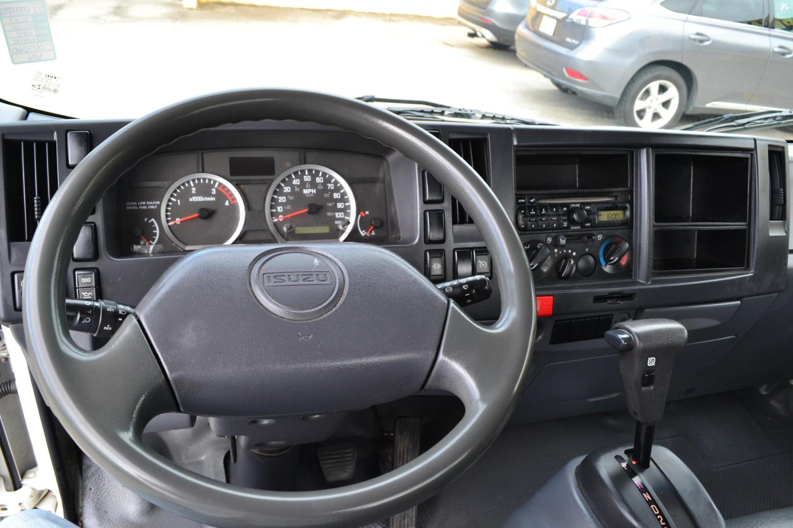 2012 WHITE /GRAY ISUZU NPR with an 4HK1TC 5.2L TURBO-CHARGED DIESEL engine, AUTOMATIC transmission, located at 9172 North Fwy, Houston, TX, 77037, (713) 910-6868, 29.887470, -95.411903 - 14,500 LB GVWR , 16FT FLATBED, 99" WIDE , EXHAUST BRAKE, POWER WINDOWS & LOCKS, COLD A/C - Photo#13