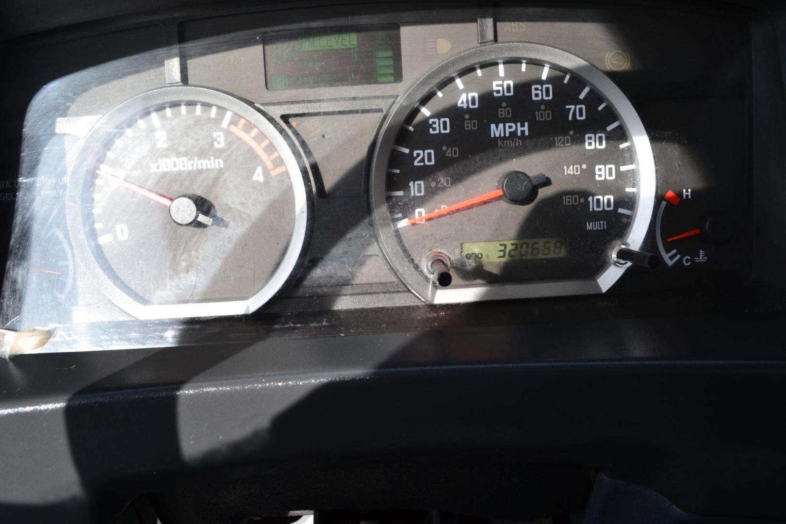 2012 WHITE /GRAY ISUZU NPR with an 4HK1TC 5.2L TURBO-CHARGED DIESEL engine, AUTOMATIC transmission, located at 9172 North Fwy, Houston, TX, 77037, (713) 910-6868, 29.887470, -95.411903 - 14,500 LB GVWR , 16FT FLATBED, 99" WIDE , EXHAUST BRAKE, POWER WINDOWS & LOCKS, COLD A/C - Photo#15
