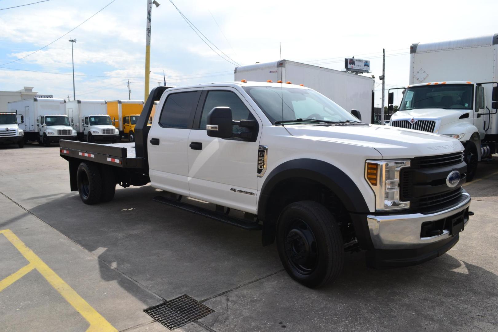 2019 WHITE /BLACK FORD F550 (1FD0W5HT8KE) with an POWERSTROKE 6.7L DIESEL engine, AUTOMATIC transmission, located at 9172 North Fwy, Houston, TX, 77037, (713) 910-6868, 29.887470, -95.411903 - 19,500 LB GVWR, 11 FT FLATBED X 96" WIDE, AXLE RATIO: 4.88, WHEELBASE: 203", 4X4 , CREW CAB, POWER WINDOWS & LOCKS, TOOLBOX, GOOSENECK/BUMPER PULL HITCH - Photo#1