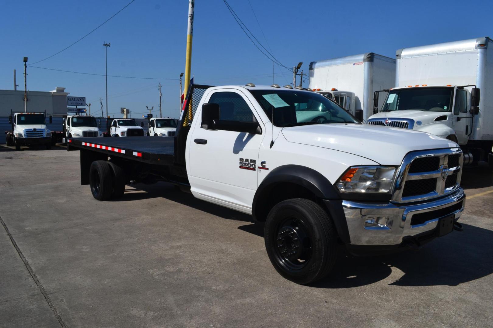 2018 WHITE /BLACK RAM 5500 TRADESMAN (3C7WRMDL1JG) with an CUMMINS 6.7L TURBO DIESEL engine, AISIN A465 6SPD AUTOMATIC transmission, located at 9172 North Fwy, Houston, TX, 77037, (713) 910-6868, 29.887470, -95.411903 - 19,5000 LB GVWR, 16 FT FLATBED X 96" WIDE, EXHAUST BRAKE, POWER WINDOWS , LOCKS & MIRRORS, COLD A/C - Photo#2