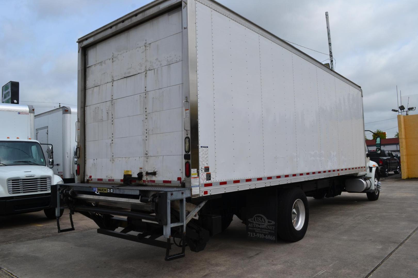 2020 WHITE /BLACK INTERNATIONAL MV 607 (1HAEUMML5LL) with an CUMMINS ISB 6.7L 240HP engine, ALLISON 2500RDS AUTOMATIC transmission, located at 9172 North Fwy, Houston, TX, 77037, (713) 910-6868, 29.887470, -95.411903 - 25,999 LB GVWR NON CDL, 26 FT BOX, HEIGHT 97" X WIDTH 102", MAXON 3,000 LB ALUMINUM LIFT GATE, AIR RIDE SUSPENSION, 90 GALLON FUEL TANK, ALUMINUM WHEELS, POWER WINDOWS, LOCKS, & MIRRORS, HEATED MIRRORS - Photo#4