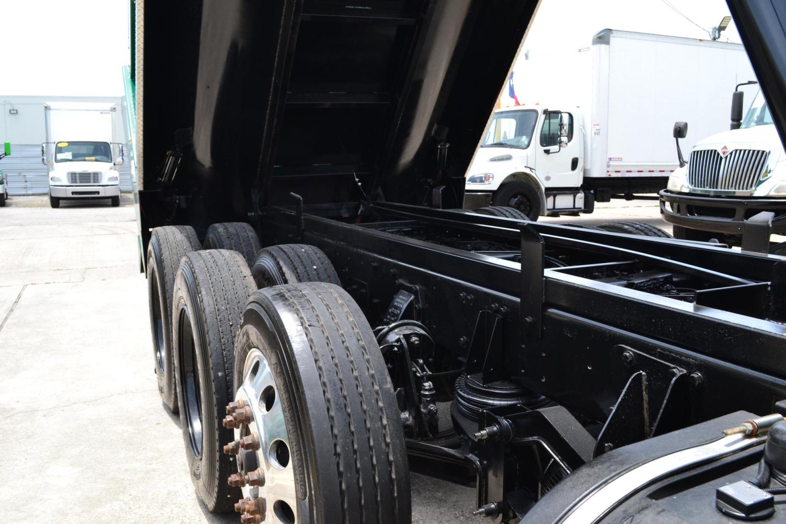 2018 GREEN /GRAY PETERBILT 567 (1XPCD49X8JD) with an CUMMINS X15 14.9L 450 HP engine, EATON FULLER 12 SPD AUTOSHIFT transmission, located at 9172 North Fwy, Houston, TX, 77037, (713) 910-6868, 29.887470, -95.411903 - 16.5 FT DUMP BED, 17 CUBIC YARDS, 14,300 LB FRONT AXLE, 40,000 LB REAR AXLE, 13,000 LB STEERABLE PUSHER AXLE, AIR TRAC SUSPENSION, FULL LOCKERS, ENGINE BRAKE, 70 GALLON FUEL TANK, RATIO; 3.36, ELECTRIC TARP M - Photo#8