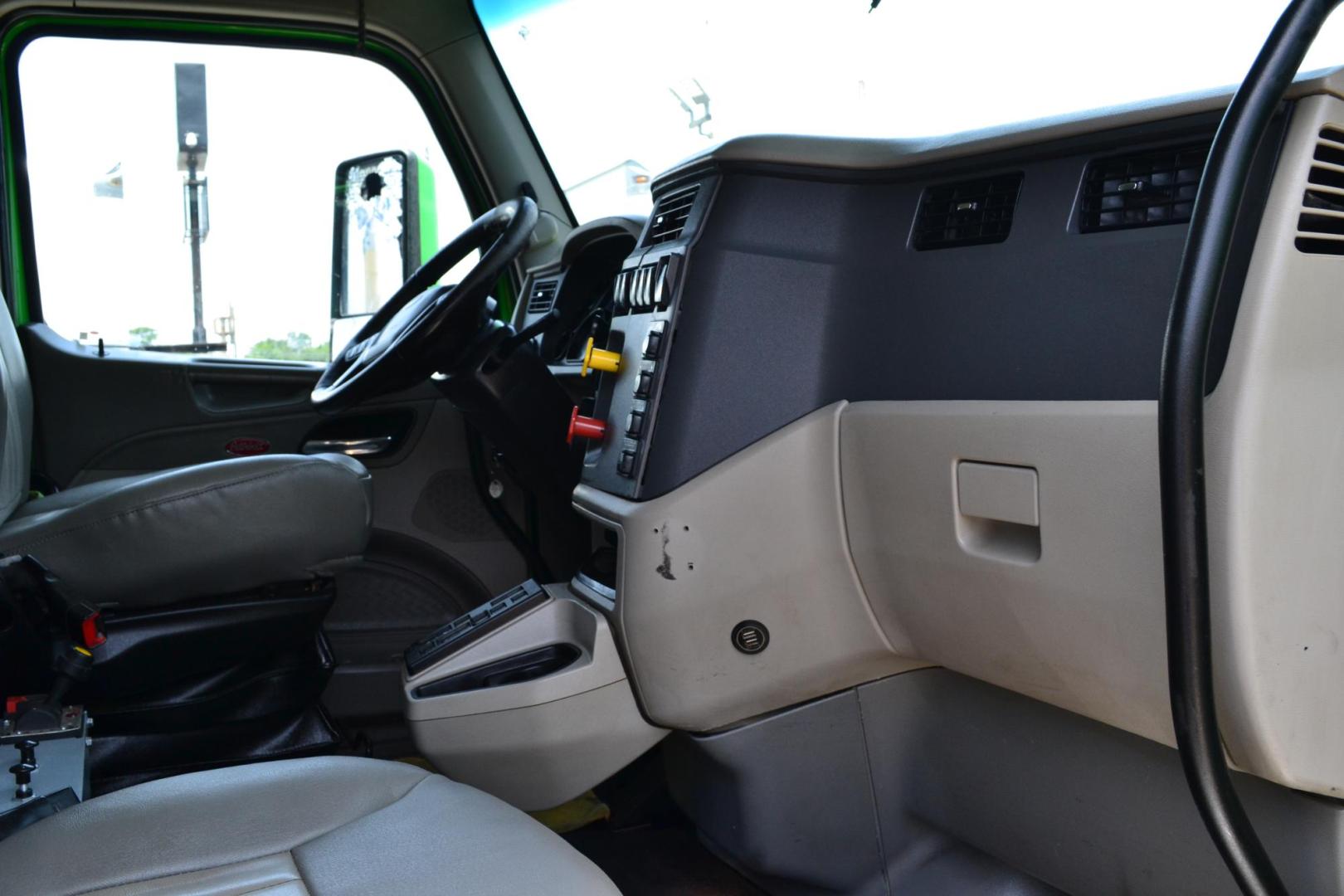 2018 GREEN /GRAY PETERBILT 567 (1XPCD49X8JD) with an CUMMINS X15 14.9L 450 HP engine, EATON FULLER 12 SPD AUTOSHIFT transmission, located at 9172 North Fwy, Houston, TX, 77037, (713) 910-6868, 29.887470, -95.411903 - 16.5 FT DUMP BED, 17 CUBIC YARDS, 14,300 LB FRONT AXLE, 40,000 LB REAR AXLE, 13,000 LB STEERABLE PUSHER AXLE, AIR TRAC SUSPENSION, FULL LOCKERS, ENGINE BRAKE, 70 GALLON FUEL TANK, RATIO; 3.36, ELECTRIC TARP M - Photo#18