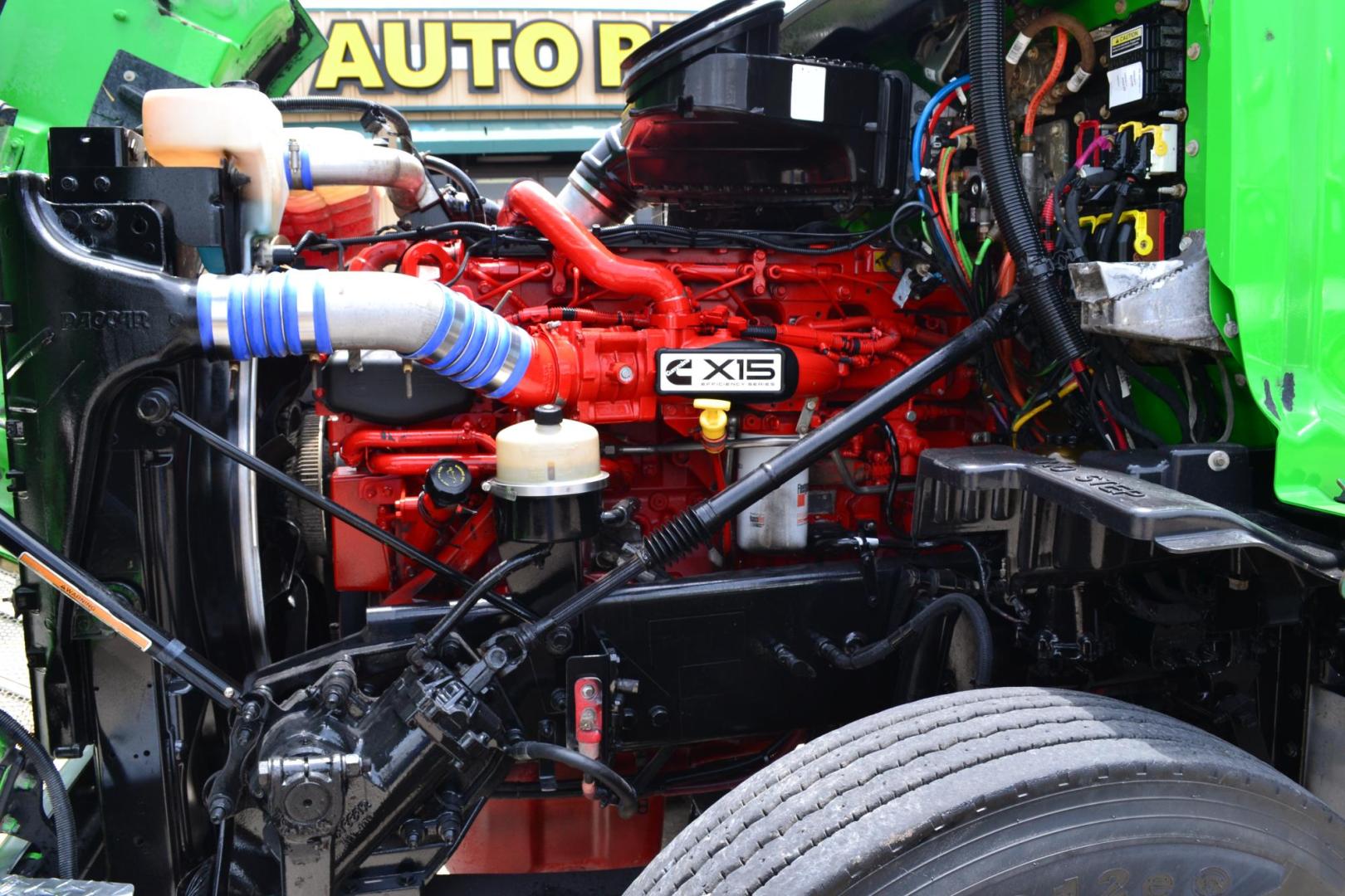 2018 GREEN /GRAY PETERBILT 567 (1XPCD49X8JD) with an CUMMINS X15 14.9L 450 HP engine, EATON FULLER 12 SPD AUTOSHIFT transmission, located at 9172 North Fwy, Houston, TX, 77037, (713) 910-6868, 29.887470, -95.411903 - 16.5 FT DUMP BED, 17 CUBIC YARDS, 14,300 LB FRONT AXLE, 40,000 LB REAR AXLE, 13,000 LB STEERABLE PUSHER AXLE, AIR TRAC SUSPENSION, FULL LOCKERS, ENGINE BRAKE, 70 GALLON FUEL TANK, RATIO; 3.36, ELECTRIC TARP M - Photo#19