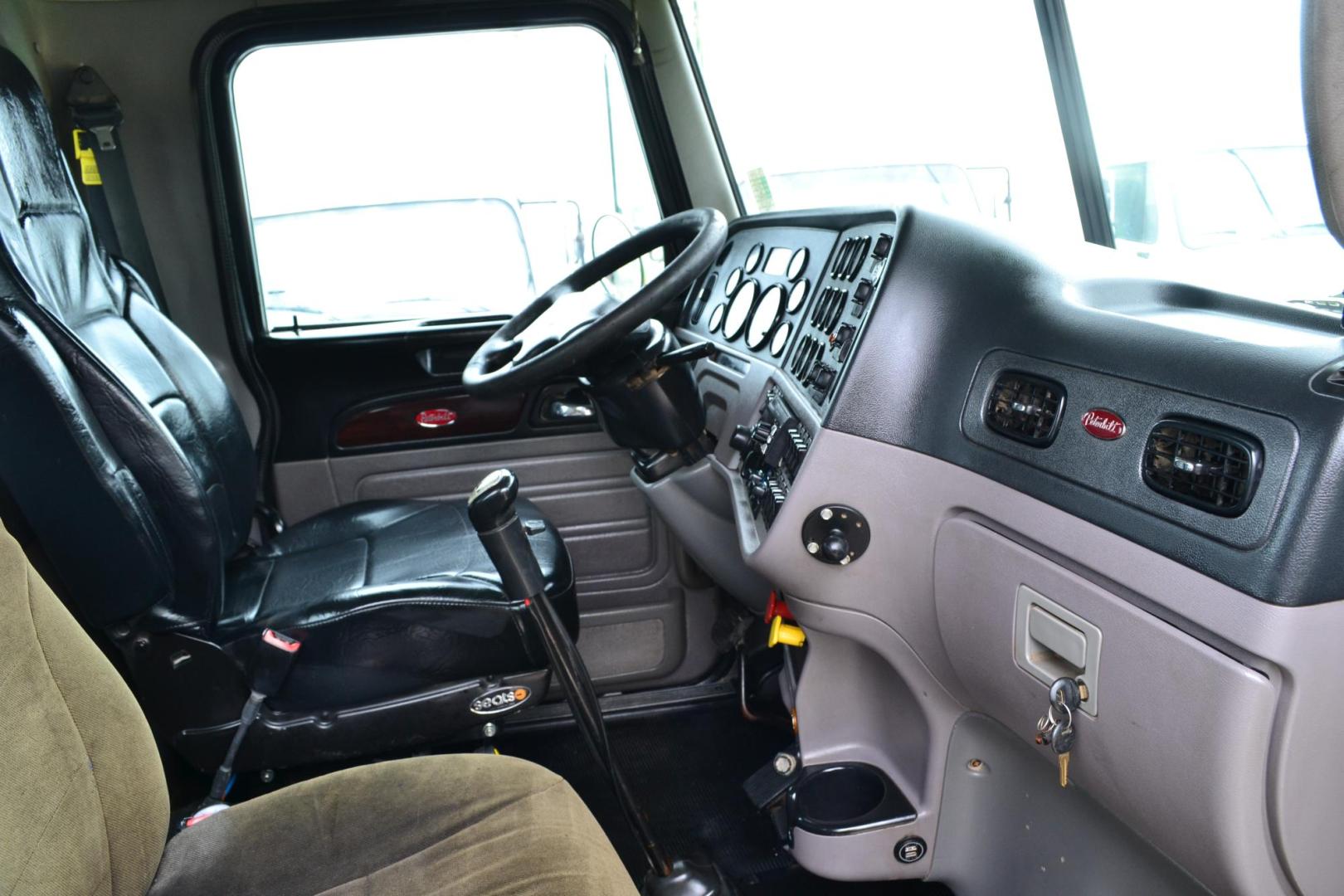 2012 GREEN /BLACK PETERBILT 367 (1XPTD49X3CD) with an CUMMINS X15 14.9L 485 HP engine, 13 SPD MANUAL transmission, located at 9172 North Fwy, Houston, TX, 77037, (713) 910-6868, 29.887470, -95.411903 - 16 FT DUMP BODY, 17 CUBIC YARDS, PETERBILT AIR TRAC SUSPENSION, FULL LOCKERS, ENGINE BRAKE, 12K FRONT , 40K REAR, 13K LIFT AXLE , POWER WINDOWS, LOCKS AND MIRRORS - Photo#14