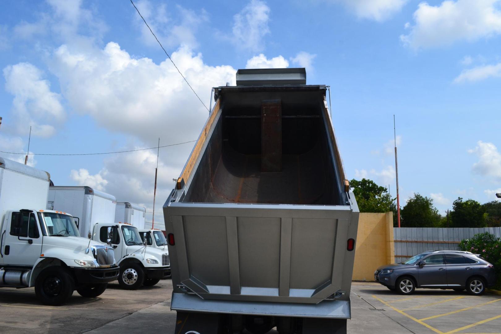 2017 SILVER /BLACK MACK CXU613 (1M1AW02Y1HM) with an MACK MP7 10.8L 395 HP engine, 10 SPD MANUAL transmission, located at 9172 North Fwy, Houston, TX, 77037, (713) 910-6868, 29.887470, -95.411903 - 15 FT DUMP BED, 16 CUBIC YARDS, 12,000LB FRONT AXLE, 40,000 LB REARS, AIR RIDE SUSPENSION, 120 GALLON FUEL TANK, ELECTRIC TARP, ENGINE BRAKE, DIFF LOCK, RATIO: 3.25, POWER WINDOWS, LOCKS & MIRRORS - Photo#9