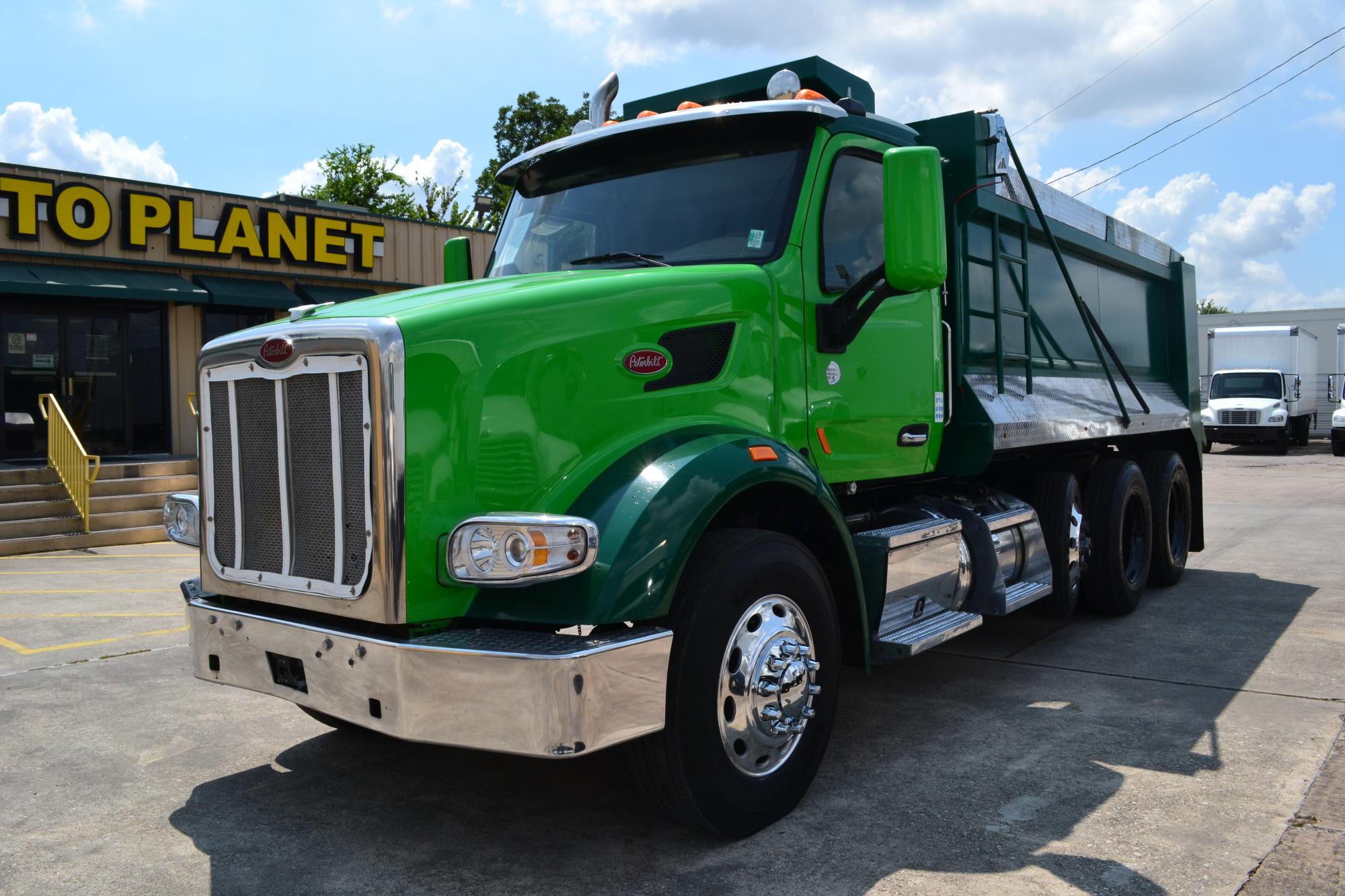 photo of 2018 PETERBILT 567 TRI AXLE 16 FT DUMP TRUCK 