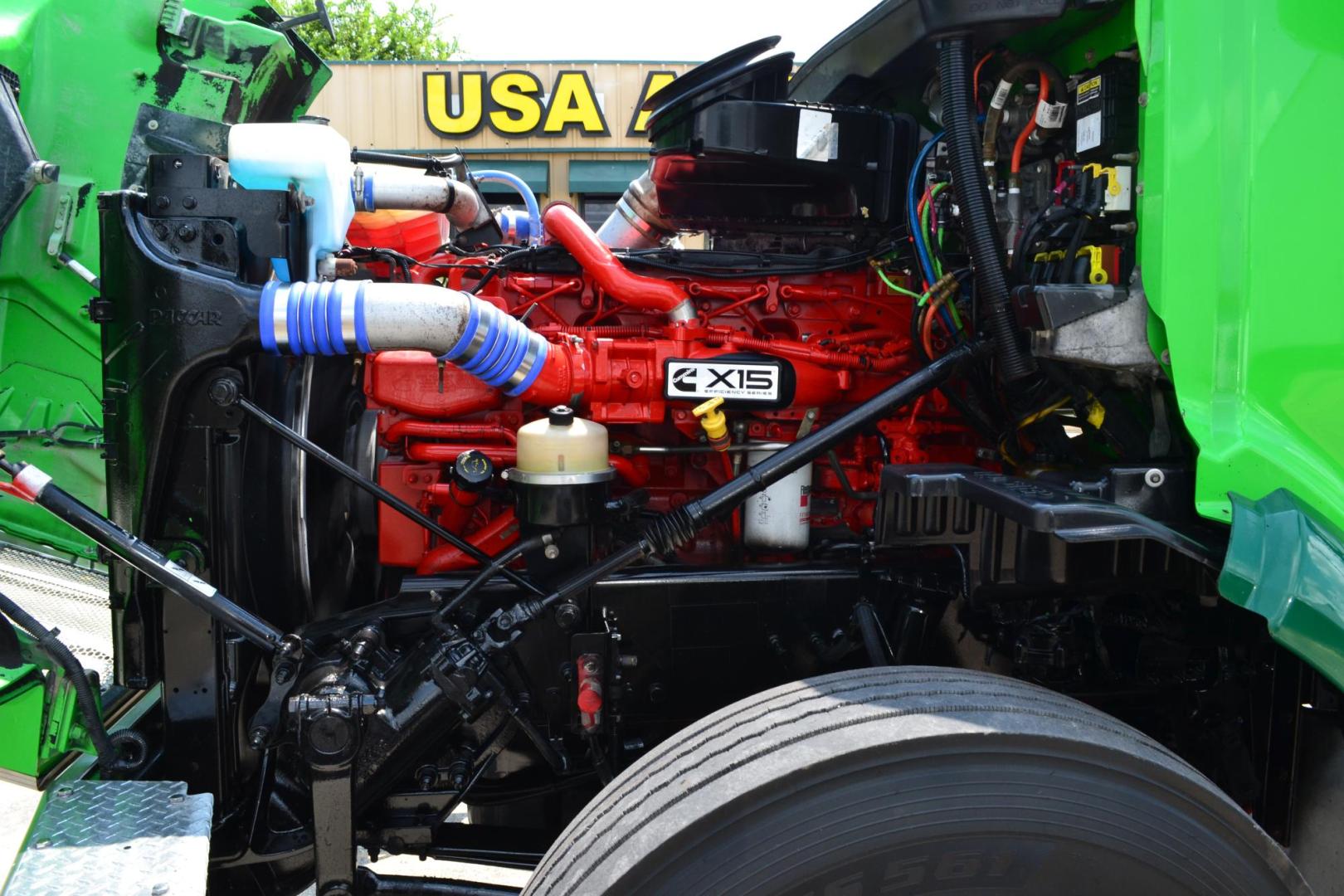 2018 GREEN /GRAY PETERBILT 567 (1XPCD49X9JD) with an CUMMINS X15 14.9L 450 HP engine, EATON FULLER 12 SPD AUTOSHIFT transmission, located at 9172 North Fwy, Houston, TX, 77037, (713) 910-6868, 29.887470, -95.411903 - Photo#16