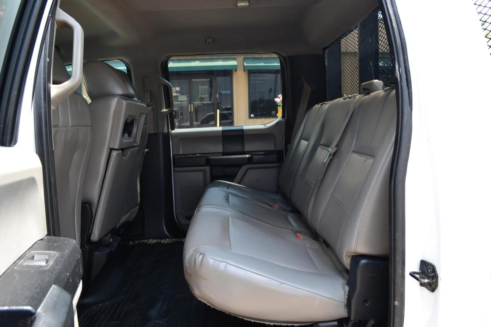 2017 WHITE /BLACK FORD F550 (1FD0W5GT9HE) with an POWERSTROKE 6.7L DIESEL engine, 6SPD AUTOMATIC transmission, located at 9172 North Fwy, Houston, TX, 77037, (713) 910-6868, 29.887470, -95.411903 - 19,500 LB GVWR, 12 FT FLATBED X 96" WIDE, PINTLE HOOK HITCH, 3 X TOOL BOXES, RATIO: 4.88 LIMITED SLIP, WHEELBASE: 203", CREW CAB, POWER WINDOWS , LOCKS & MIRRORS - Photo#9