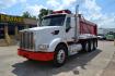2015 WHITE /BLACK PETERBILT 567 (1XPCD49X3FD) with an CUMMINS X15 14.9L 450 HP engine, 10 SPD MANUAL transmission, located at 9172 North Fwy, Houston, TX, 77037, (713) 910-6868, 29.887470, -95.411903 - FRONT AXLE: 14,320 LB / REAR AXLE: 40,000 LB / STEERABLE LIFT AXLE: 13,000 LB, 17 FT DUMP BED, 17 CUBIC YARDS, AIR TRAC SUSPENSION, DIFF LOCK, ENGINE BRAKE, WHEELBASE: 225", RATIO: 3.70, ELECTRIC TARP, POWER WINDOWS & LOCKS , DUAL STACKS - Photo#0