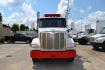 2015 WHITE /BLACK PETERBILT 567 (1XPCD49X3FD) with an CUMMINS X15 14.9L 450 HP engine, 10 SPD MANUAL transmission, located at 9172 North Fwy, Houston, TX, 77037, (713) 910-6868, 29.887470, -95.411903 - FRONT AXLE: 14,320 LB / REAR AXLE: 40,000 LB / STEERABLE LIFT AXLE: 13,000 LB, 17 FT DUMP BED, 17 CUBIC YARDS, AIR TRAC SUSPENSION, DIFF LOCK, ENGINE BRAKE, WHEELBASE: 225", RATIO: 3.70, ELECTRIC TARP, POWER WINDOWS & LOCKS , DUAL STACKS - Photo#1
