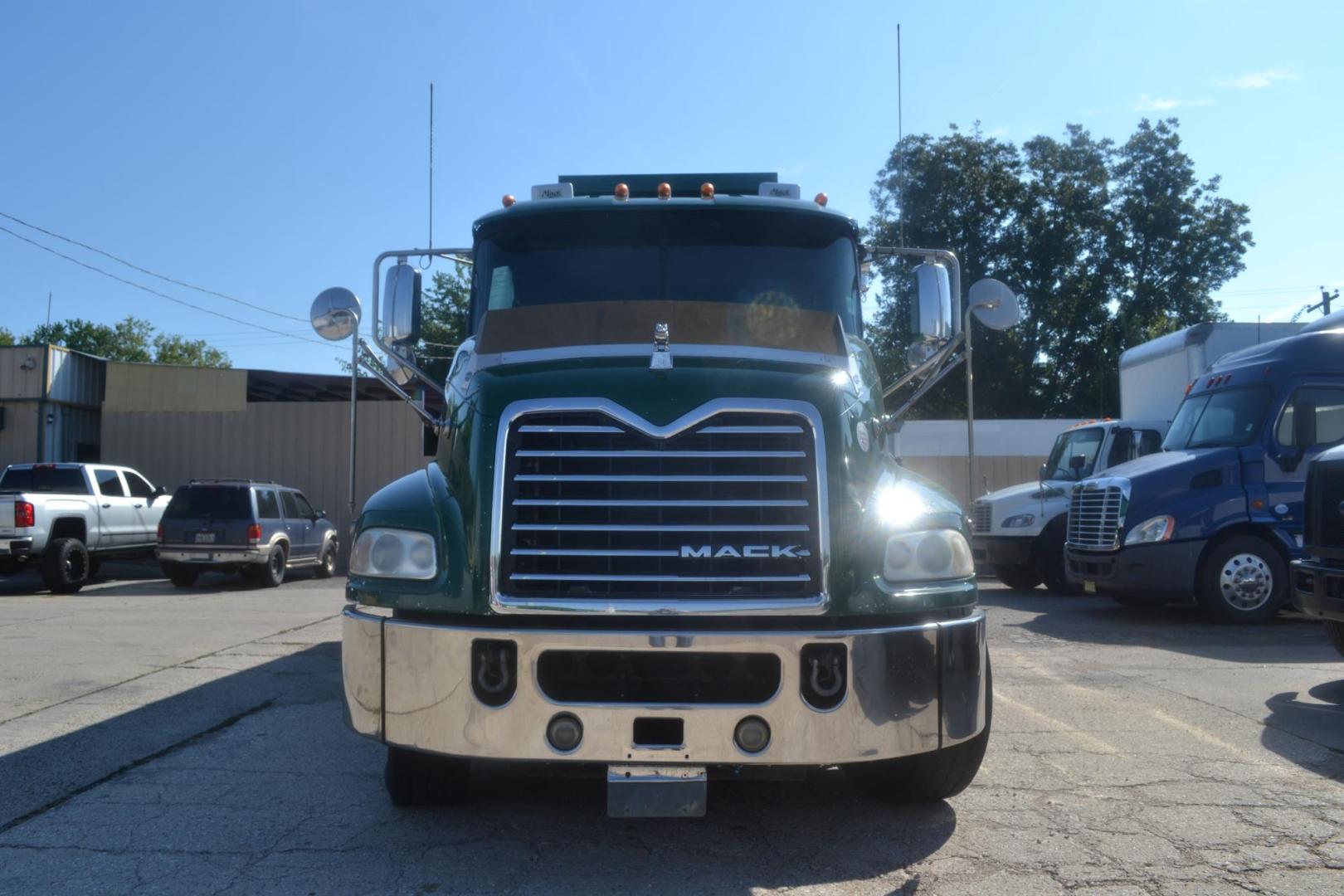 2017 GREEN /BLACK MACK CXU613 (1M1AW07Y0HM) with an MACK MP8 12.8L 505HP engine, 18 SPD MANUAL transmission, located at 9172 North Fwy, Houston, TX, 77037, (713) 910-6868, 29.887470, -95.411903 - 19 FT DUMP BODY= 22 CUBIC YARDS,FRONT AXLE: 14,600 LB , 2 X LIFT AXLES : 13,000 LB, REAR AXLE: 46,000 LB, WHEELBASE: 252", RATIO: 3.73, DOUBLE CHASSIS, FULL LOCKERS, 315 FRONT TIRES, AIR RIDE SUSPENSION, ELECTRIC TARP, 75 GALLON FUEL CAPACITY, AIR TAILGATE, ENGINE BRAKE, POWER WINDOWS & LOCKS & MIRR - Photo#1
