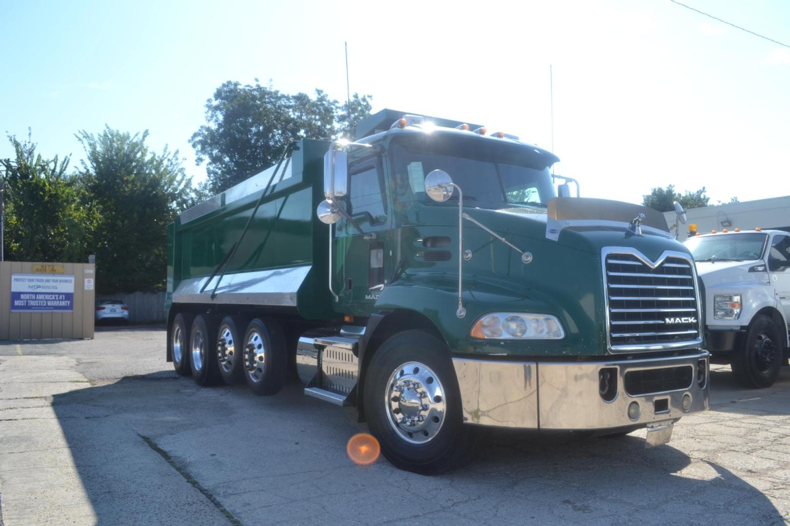 2017 GREEN /BLACK MACK CXU613 (1M1AW07Y0HM) with an MACK MP8 12.8L 505HP engine, 18 SPD MANUAL transmission, located at 9172 North Fwy, Houston, TX, 77037, (713) 910-6868, 29.887470, -95.411903 - 19 FT DUMP BODY= 22 CUBIC YARDS,FRONT AXLE: 14,600 LB , 2 X LIFT AXLES : 13,000 LB, REAR AXLE: 46,000 LB, WHEELBASE: 252", RATIO: 3.73, DOUBLE CHASSIS, FULL LOCKERS, 315 FRONT TIRES, AIR RIDE SUSPENSION, ELECTRIC TARP, 75 GALLON FUEL CAPACITY, AIR TAILGATE, ENGINE BRAKE, POWER WINDOWS & LOCKS & MIRR - Photo#2