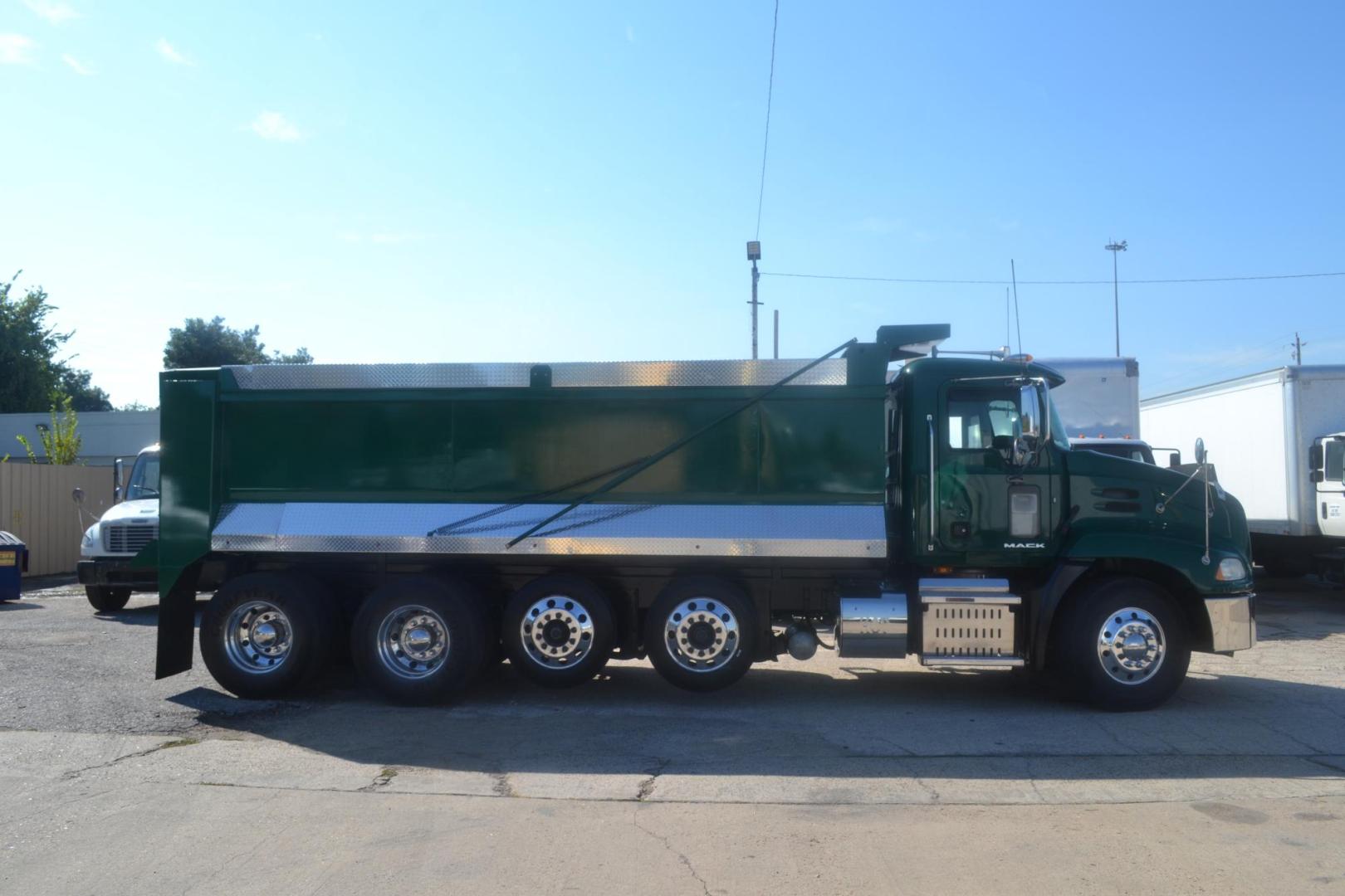 2017 GREEN /BLACK MACK CXU613 (1M1AW07Y0HM) with an MACK MP8 12.8L 505HP engine, 18 SPD MANUAL transmission, located at 9172 North Fwy, Houston, TX, 77037, (713) 910-6868, 29.887470, -95.411903 - 19 FT DUMP BODY= 22 CUBIC YARDS,FRONT AXLE: 14,600 LB , 2 X LIFT AXLES : 13,000 LB, REAR AXLE: 46,000 LB, WHEELBASE: 252", RATIO: 3.73, DOUBLE CHASSIS, FULL LOCKERS, 315 FRONT TIRES, AIR RIDE SUSPENSION, ELECTRIC TARP, 75 GALLON FUEL CAPACITY, AIR TAILGATE, ENGINE BRAKE, POWER WINDOWS & LOCKS & MIRR - Photo#3