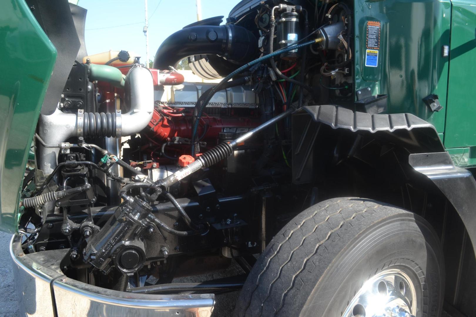 2017 GREEN /BLACK MACK CXU613 (1M1AW07Y0HM) with an MACK MP8 12.8L 505HP engine, 18 SPD MANUAL transmission, located at 9172 North Fwy, Houston, TX, 77037, (713) 910-6868, 29.887470, -95.411903 - 19 FT DUMP BODY= 22 CUBIC YARDS,FRONT AXLE: 14,600 LB , 2 X LIFT AXLES : 13,000 LB, REAR AXLE: 46,000 LB, WHEELBASE: 252", RATIO: 3.73, DOUBLE CHASSIS, FULL LOCKERS, 315 FRONT TIRES, AIR RIDE SUSPENSION, ELECTRIC TARP, 75 GALLON FUEL CAPACITY, AIR TAILGATE, ENGINE BRAKE, POWER WINDOWS & LOCKS & MIRR - Photo#22